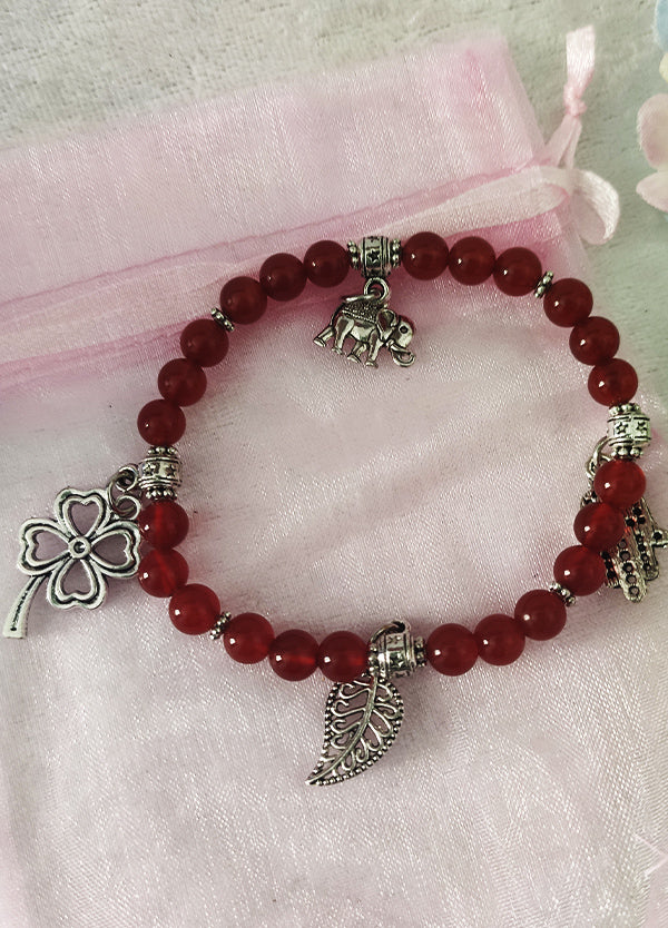 Pulsera para el ÉXITO Con 4 dijes de Cornalina AMULETO
